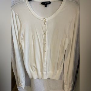 Sweater.  White. Business casual.